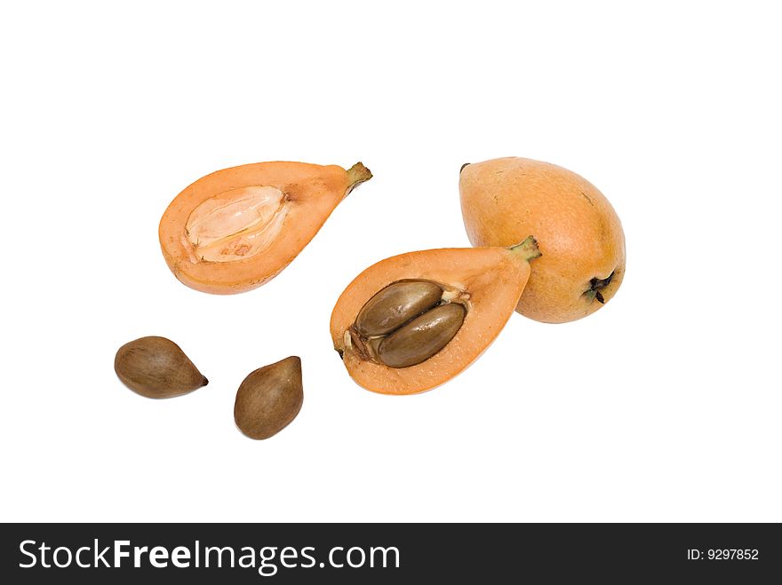 Loquat and its sections isolated on white background