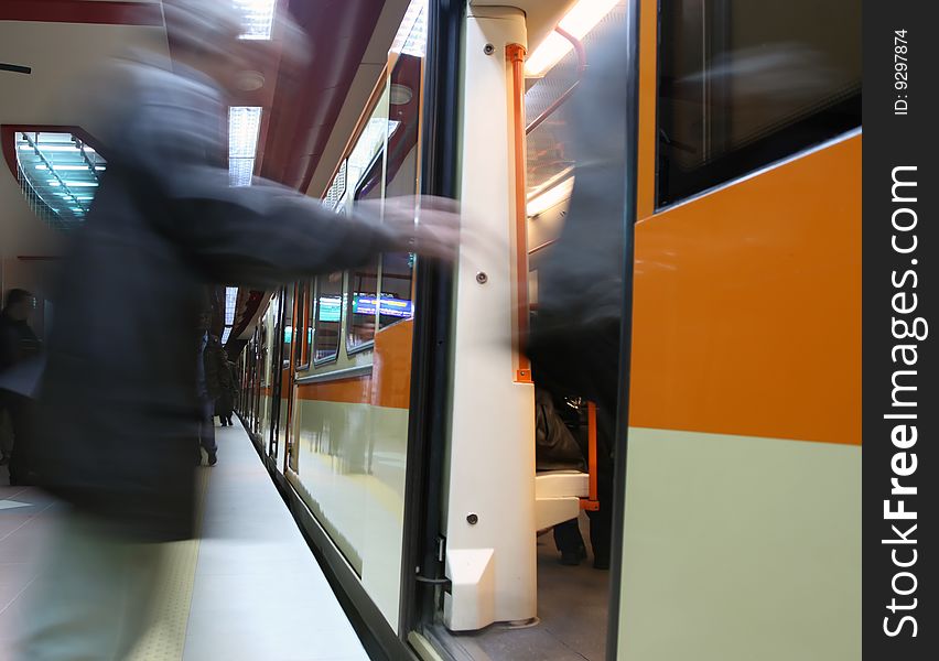 Motion-blur passengers at subway station