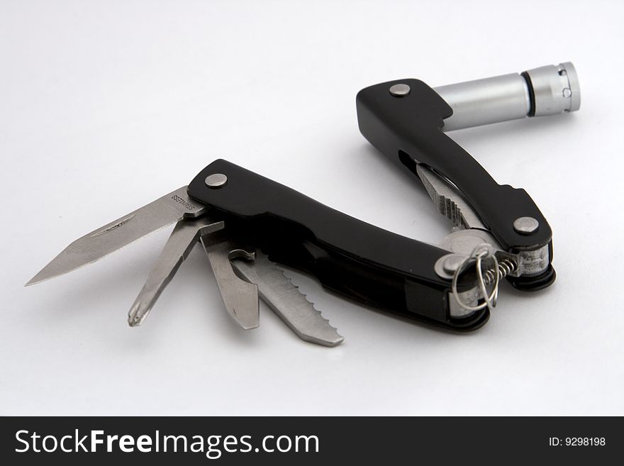 Black Swiss army knife isolated