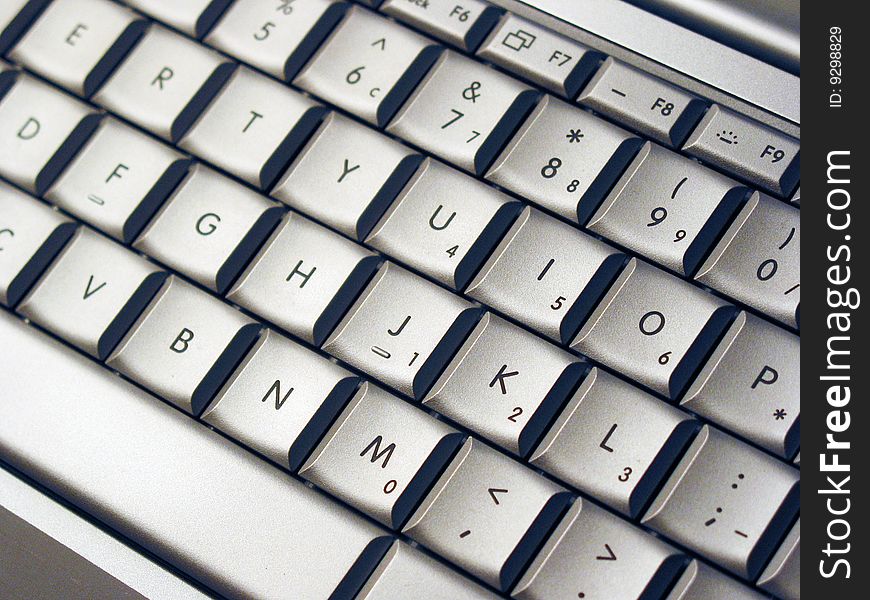 A laptop aluminum keyboard at closeup