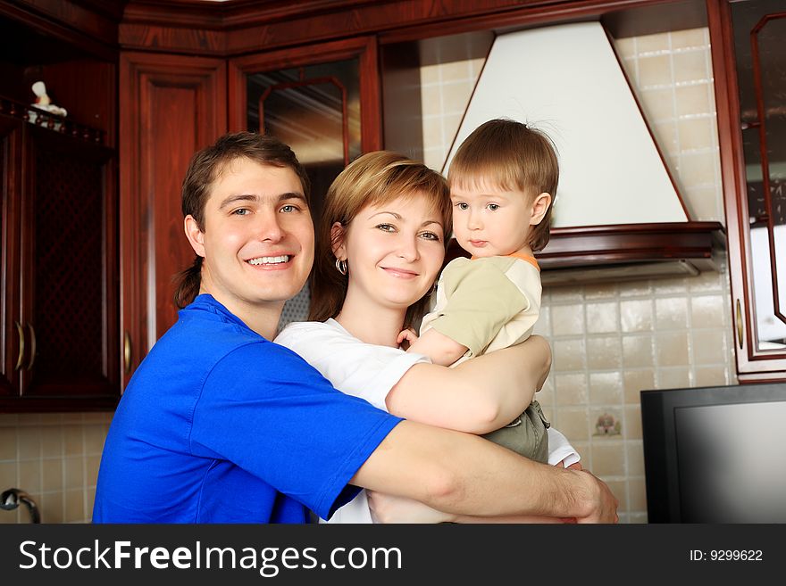 Happy family having a meal at home. Happy family having a meal at home.