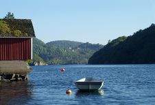 Dinghy And Old Boathouse Royalty Free Stock Photo Dinghy And Old Boathouse Royalty Free Stock Photo