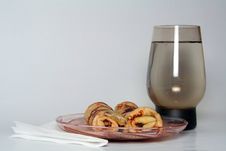 Rolled Pancakes With Strawberry Jam And A Glass Of Water Stock Image Rolled Pancakes With Strawberry Jam And A Glass Of Water Stock Image