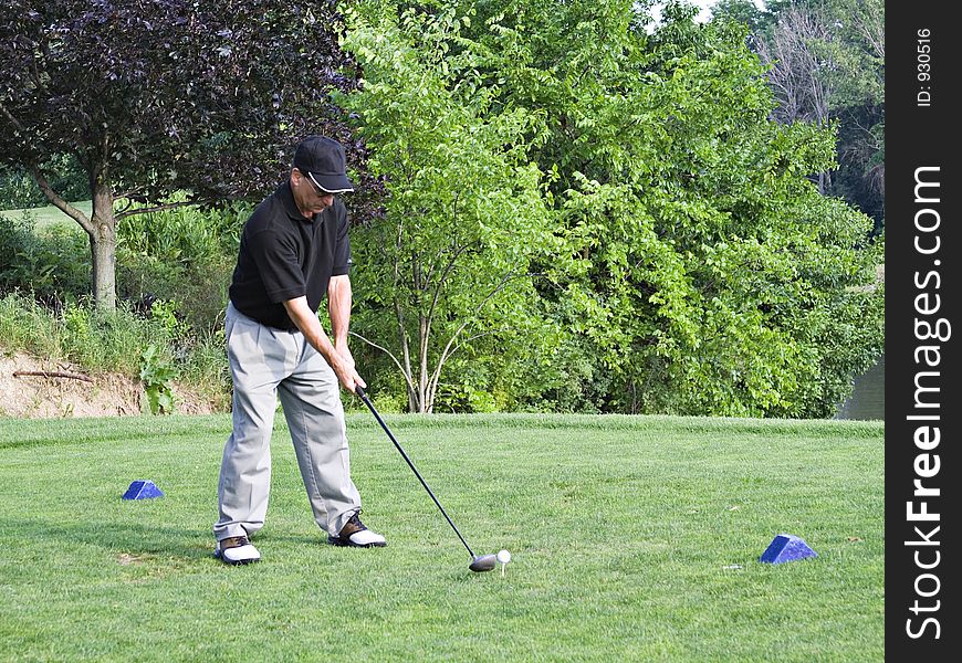 Man teeing off from the blue tees.