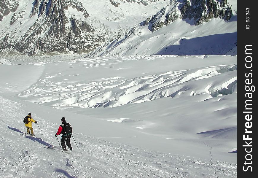 Snowboarder and Skier on the Vallee Blanche. Snowboarder and Skier on the Vallee Blanche