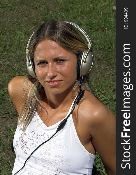 Woman Listening To Music Outdoor