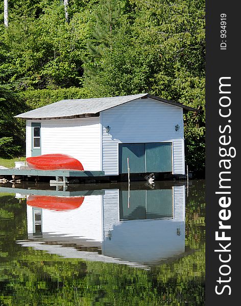 Boathouse on a lake vertical