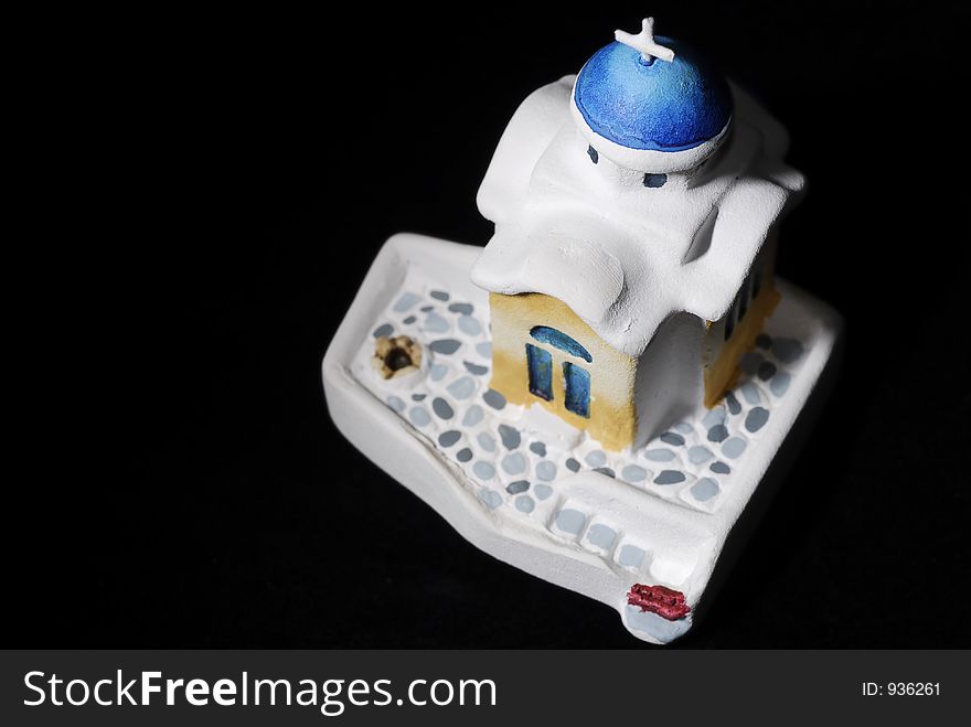 Small isolated ceramic model of a church. Small isolated ceramic model of a church
