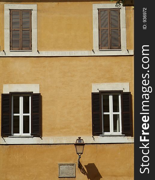 Windows of old building in Rome