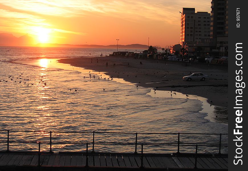 Sunset on Strand Beach. On False Bay, Western Cape SA. Sunset on Strand Beach. On False Bay, Western Cape SA