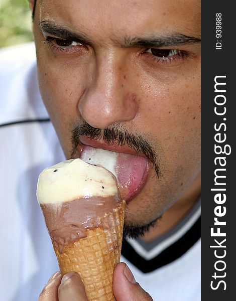 Portrait of a man eating ice cream