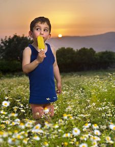 Young Boy Having An Popsicle Royalty Free Stock Image Young Boy Having An Popsicle Royalty Free Stock Image