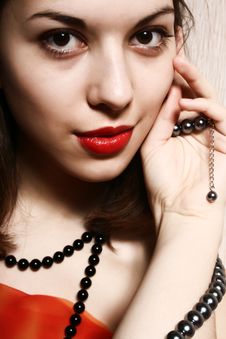 Beads And Red Lips. Royalty Free Stock Photography