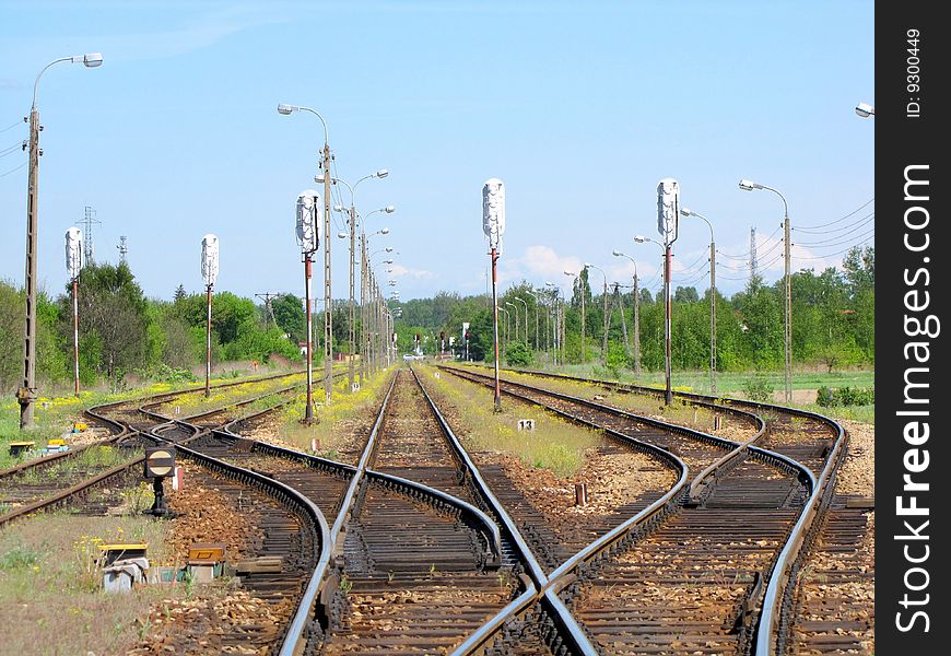 Railway tracks crossing at the station