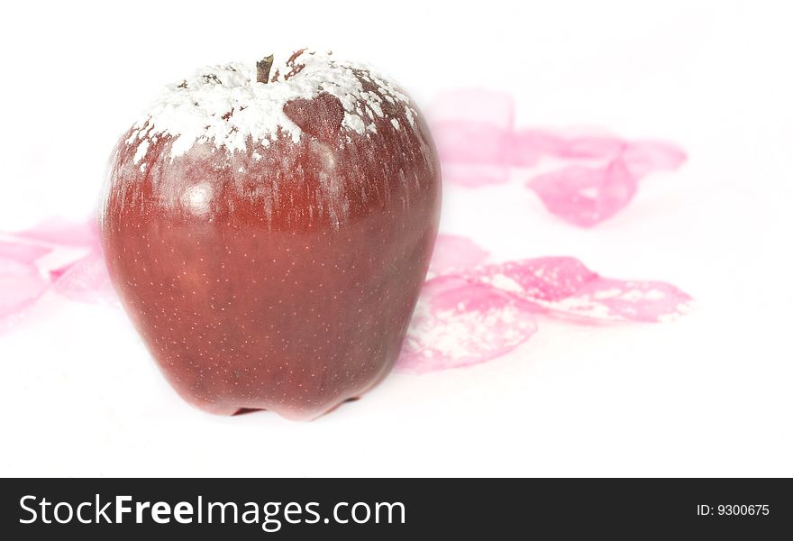 Sweet apple on white background with sugar ans heart. Sweet apple on white background with sugar ans heart.