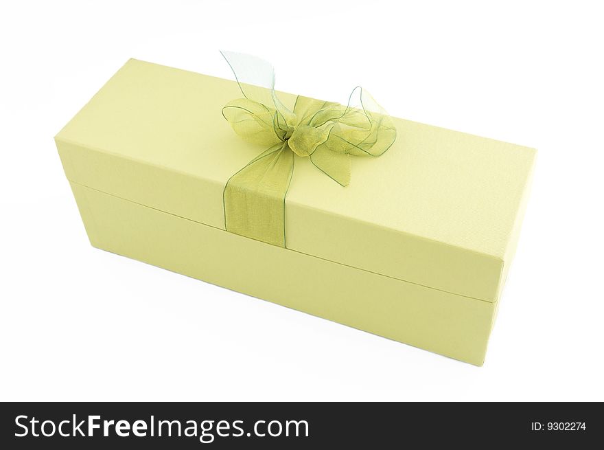 Pale green gift box with ribbon isolated on white background