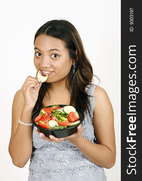 Girl eating salad