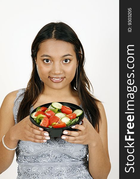 Girl eating salad