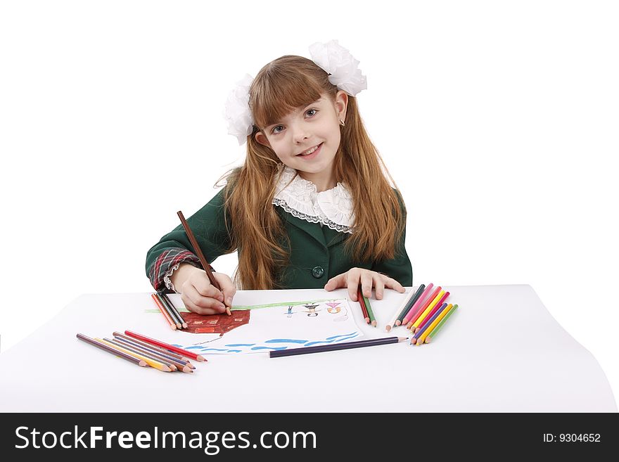 Girl is drawing in pencil. Schoolgirl is painting her family in bright colours. Isolated over white background. Girl is drawing in pencil. Schoolgirl is painting her family in bright colours. Isolated over white background.