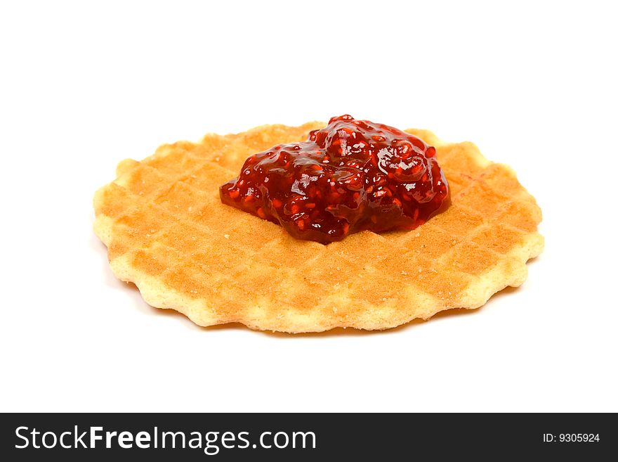 Cookie with raspberry jam, isolated on white.