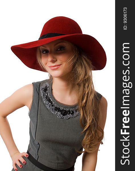 Young female in hat isolated over white with clipping path