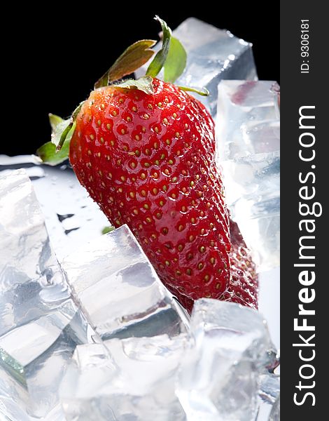 Juicy strawberry with ice cubes