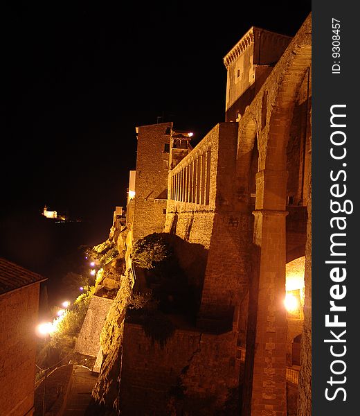 A night view of Pitigliano, an ancient town in the South Tuscany, built on stone. A night view of Pitigliano, an ancient town in the South Tuscany, built on stone