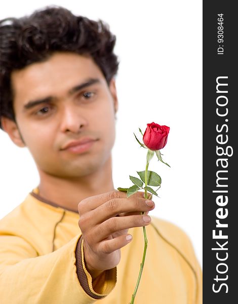 Young handsome man with red rose. Young handsome man with red rose