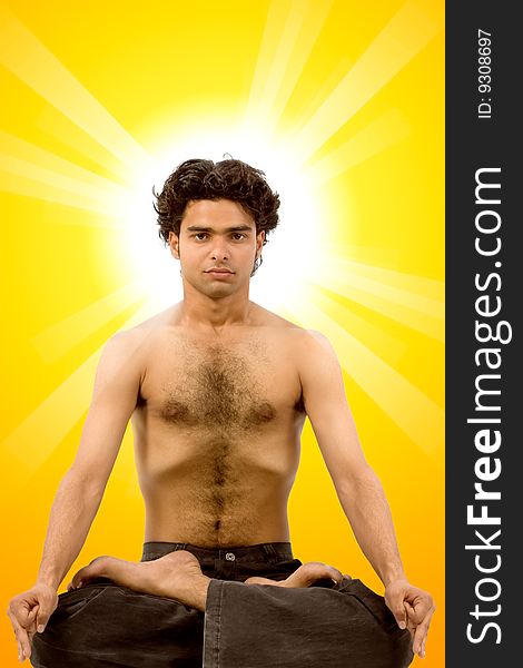 Photo of young man doing meditation in pose of lotus. Photo of young man doing meditation in pose of lotus