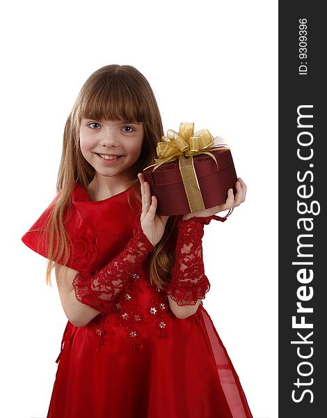 Beautiful girl is giving the gift. Female with present. Attractive lady is holding purple box with gold ribbon. Isolated over white background. Beautiful girl is giving the gift. Female with present. Attractive lady is holding purple box with gold ribbon. Isolated over white background.