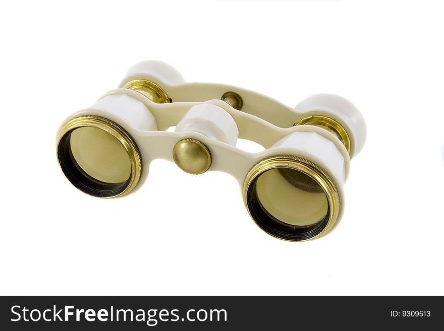 Old opera glasses isolated over white background