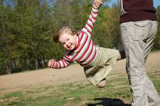 Little Girl Receive Pleasures From Turned Royalty Free Stock Photography
