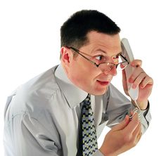 Man In Glasses With A Telephone Royalty Free Stock Photography Man In Glasses With A Telephone Royalty Free Stock Photography