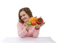 Housewife Is Holding Plate With Vegetables Stock Photo