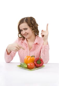Pretty Girl With Fresh Vegetables. Royalty Free Stock Image