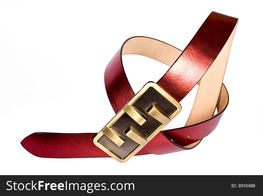 A leather belt isolated on white background. A leather belt isolated on white background