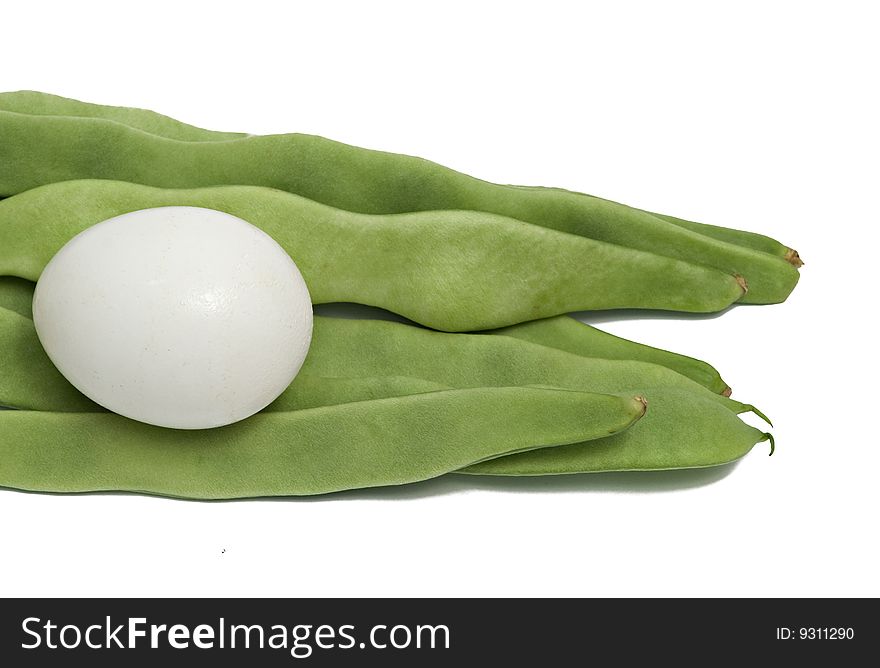 Green beans and egg isolated on white background