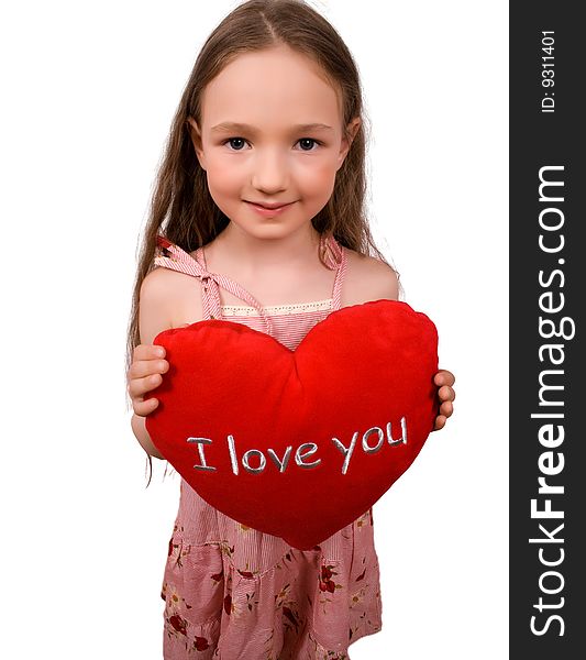 Nice little girl with soft heart toy isolated on white with clipping path
