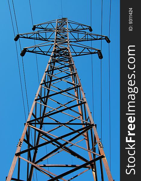 Electrical Tower On A Background Of The Blue Sky