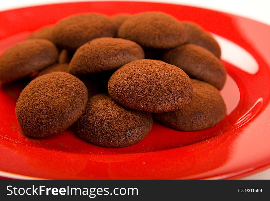 Chocolate truffle cookies on red plate