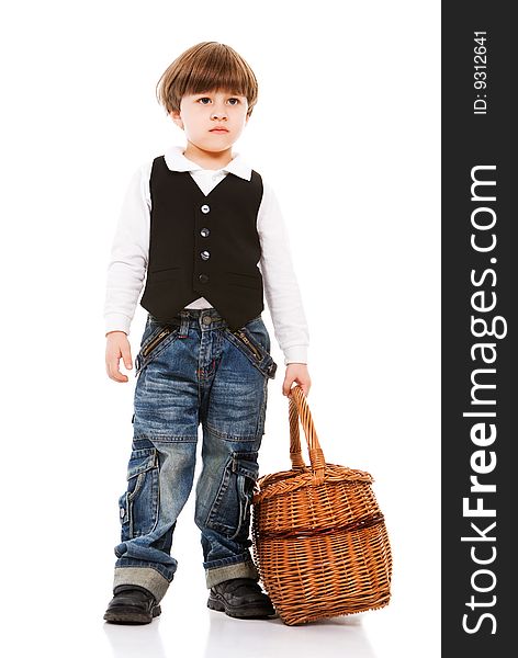 Handsome little boy holding basket, isolated on white
