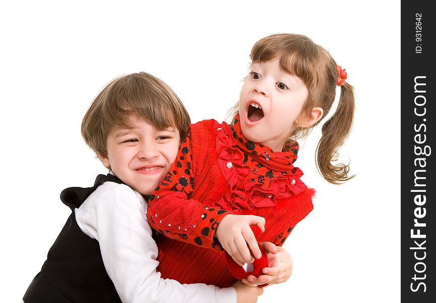 Adorable little boy hugging his sister too hard