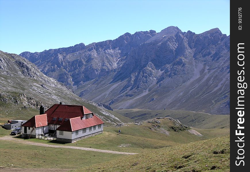 Farmhouse set in alpine pasture. Farmhouse set in alpine pasture