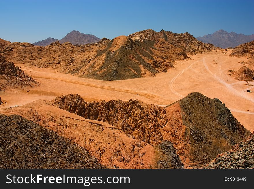 Sinai mountains view - desert and blue sky. Sinai mountains view - desert and blue sky