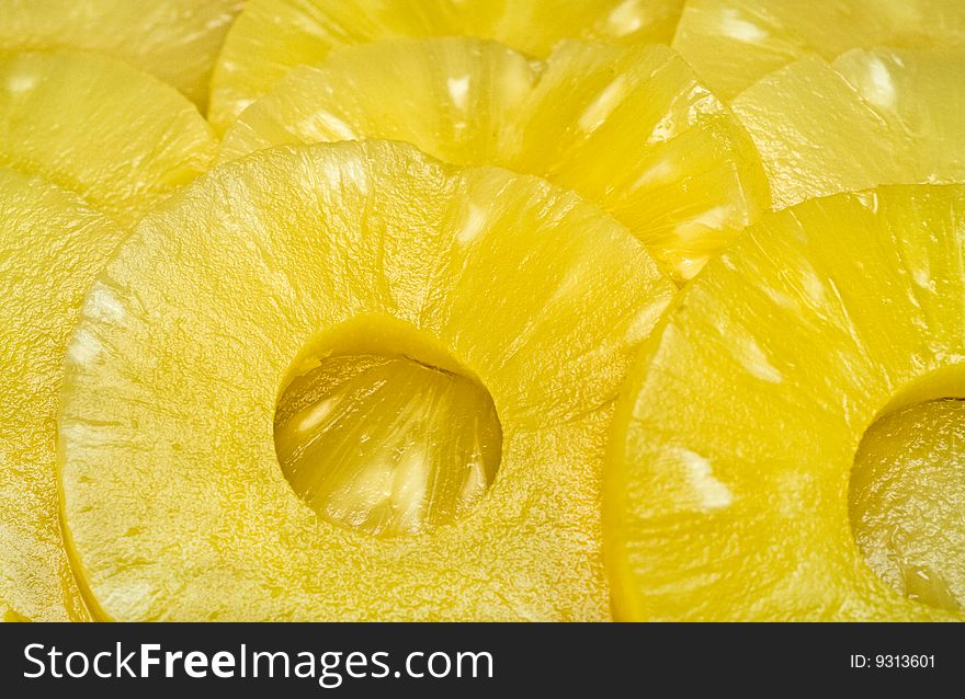 Background made from sliced pineapples. Background made from sliced pineapples