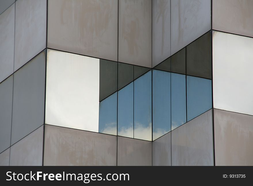 Glass building with sky and clouds reflection. Glass building with sky and clouds reflection