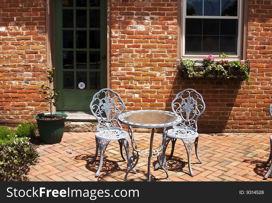 Cafe front with table and chairs