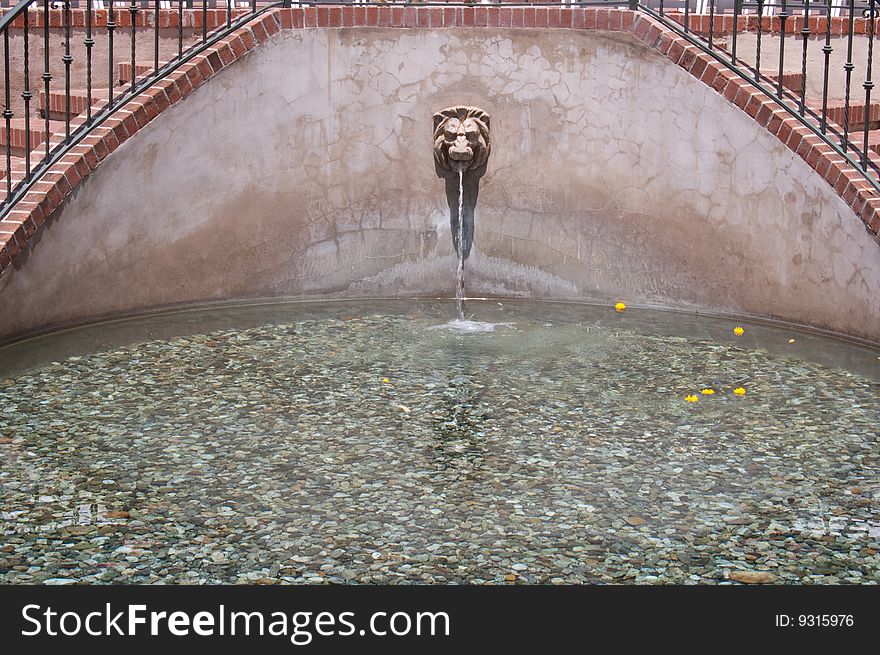 Lion head water fountain in Balboa Park