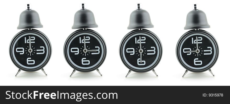 Black alarm clocks in isolated white background