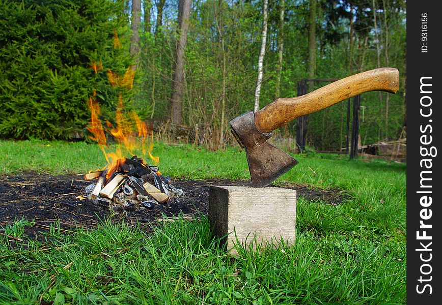The beginning of picnic. An axe and a fire. Showing of power. The beginning of picnic. An axe and a fire. Showing of power
